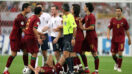 English forward Wayne Rooney (9) argues